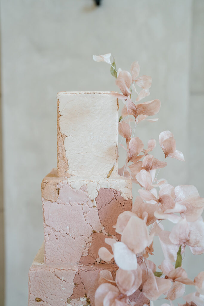 Neutral and light pink toned wedding reception decor with European influence at one of San Diego's best venues Monserate Winery, designed by wedding planner Bryce Gaston Events. 
