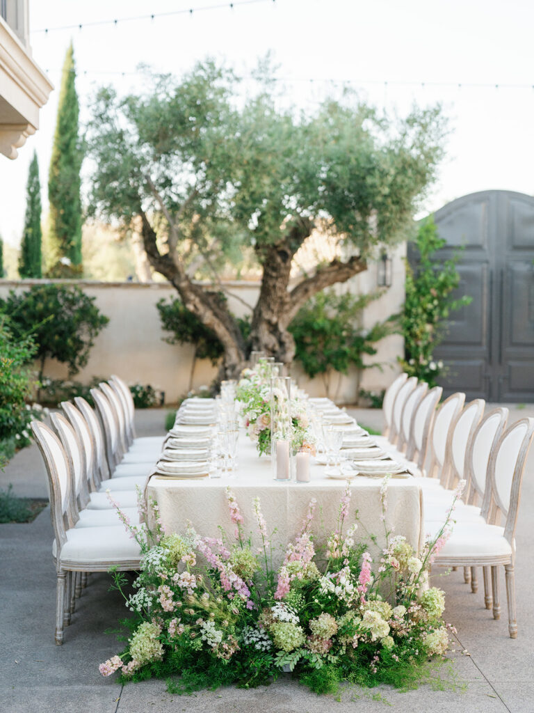 Neutral and light pink toned wedding reception decor with European influence at one of San Diego's best venues Monserate Winery, designed by wedding planner Bryce Gaston Events. 
