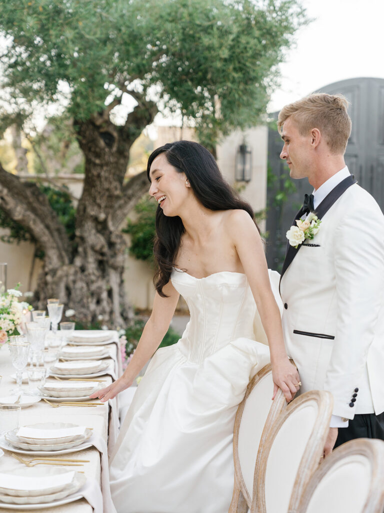 Neutral and light pink toned wedding reception decor with European influence at one of San Diego's best venues Monserate Winery, designed by wedding planner Bryce Gaston Events. 