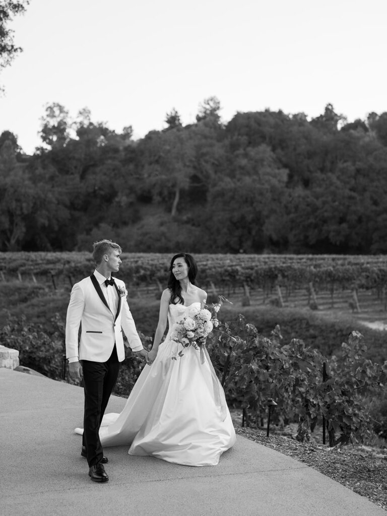 Neutral and light pink toned wedding reception decor with European influence at one of San Diego's best venues Monserate Winery, designed by wedding planner Bryce Gaston Events. 